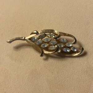 BSK Gold toned Leaf Brooch with Clear Rhinestones